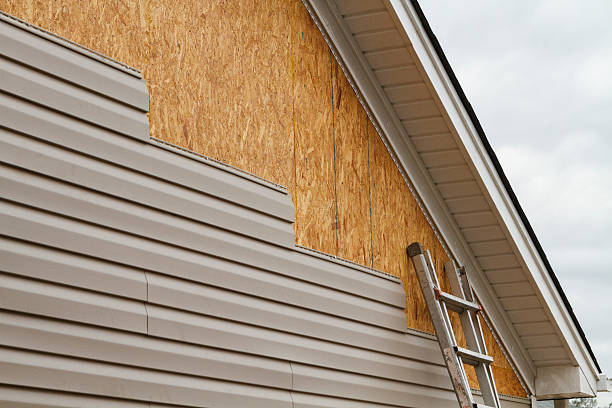Professional Fiber Cement Siding technician working in Northport, NY